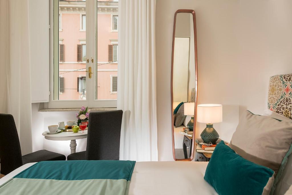 A bed or beds in a room at Boutique Hotel Atelier '800