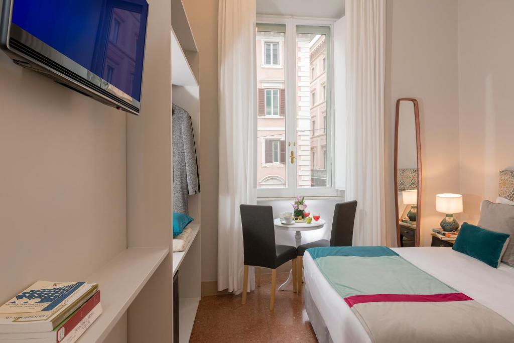 A bed or beds in a room at Boutique Hotel Atelier '800