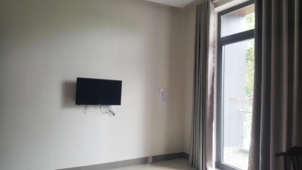TV a/nebo společenská místnost v ubytování Motel Thanh Long