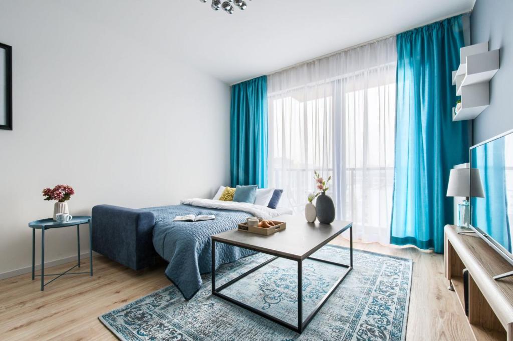 Posteľ alebo postele v izbe v ubytovaní Konstruktorska P&O Serviced Apartments