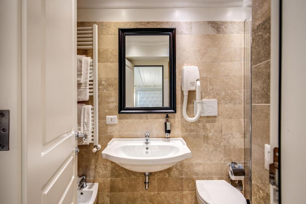 Koupelna v ubytování Hotel Domus Mea