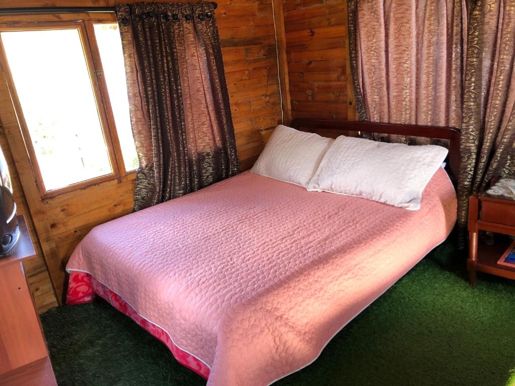 Postel nebo postele na pokoji v ubytování CABAÑAS VILLA INES DE SUESCA