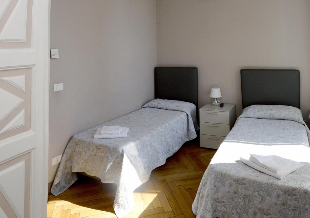 Postel nebo postele na pokoji v ubytování Hotel Mediterranee