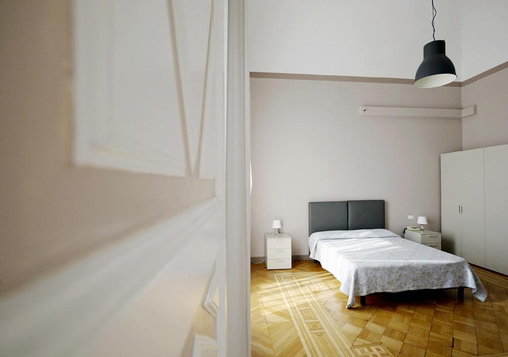 Postel nebo postele na pokoji v ubytování Hotel Mediterranee