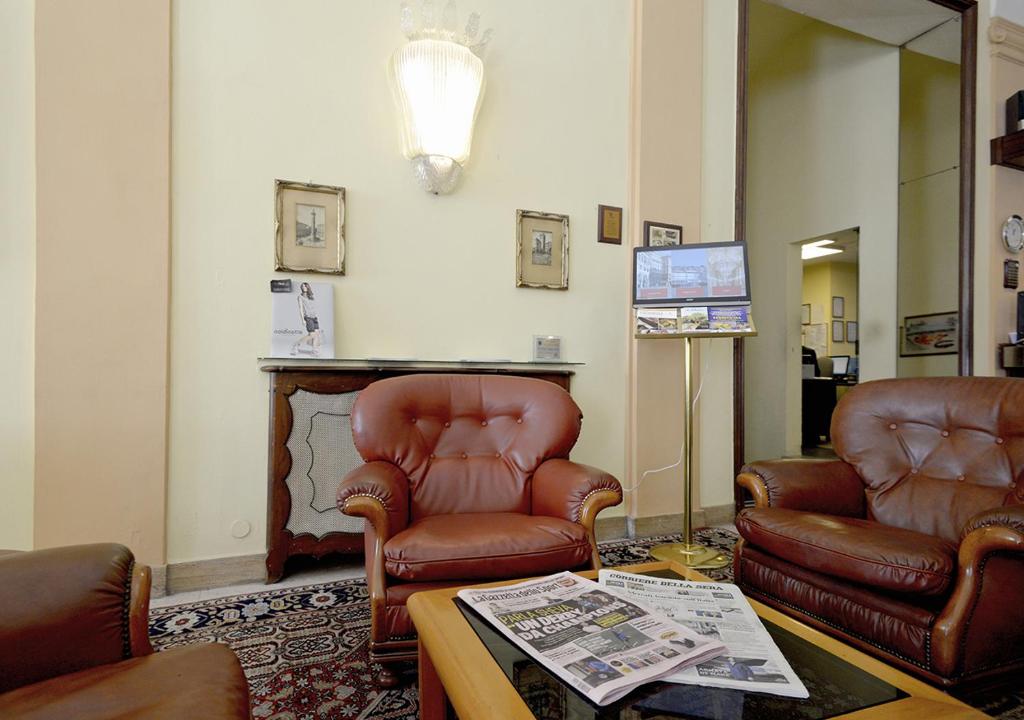 TV a/nebo společenská místnost v ubytování Hotel Mediterranee