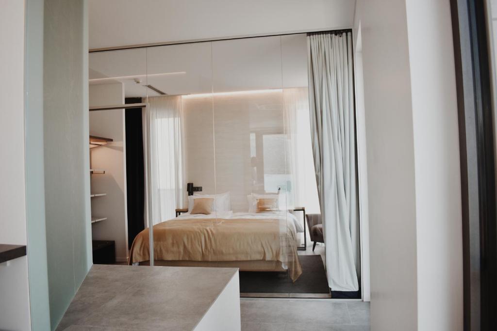 Posteľ alebo postele v izbe v ubytovaní Sky Beach Aparthotel
