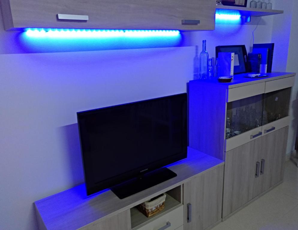 Televízia a/alebo spoločenská miestnosť v ubytovaní Apartamentos Coralba - Dúplex Bahía de Cádiz