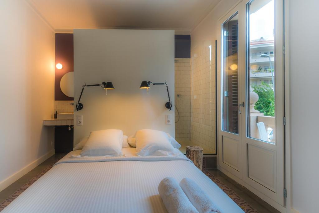 Postel nebo postele na pokoji v ubytování Habitació amb encant
