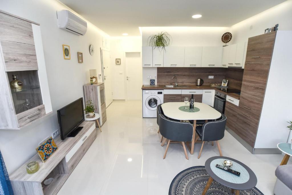 Kuchyňa alebo kuchynka v ubytovaní Apartman Mar