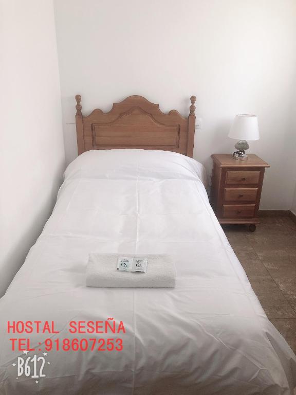 Postel nebo postele na pokoji v ubytování Hostal Seseña
