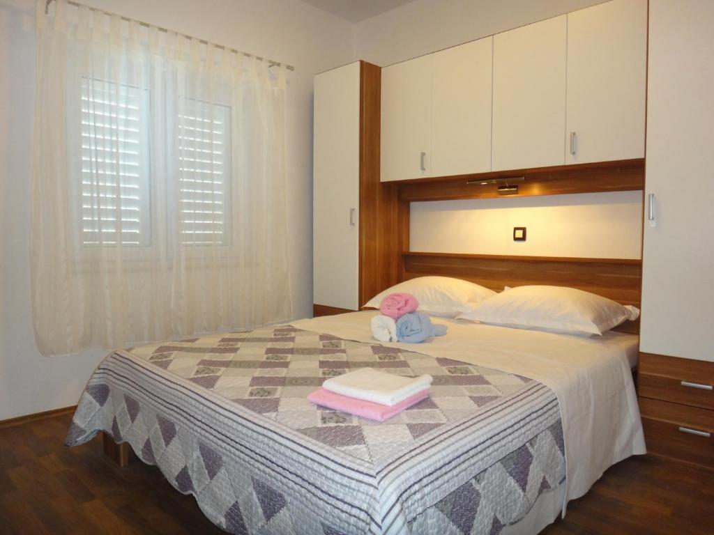 Posteľ alebo postele v izbe v ubytovaní Apartments Selina