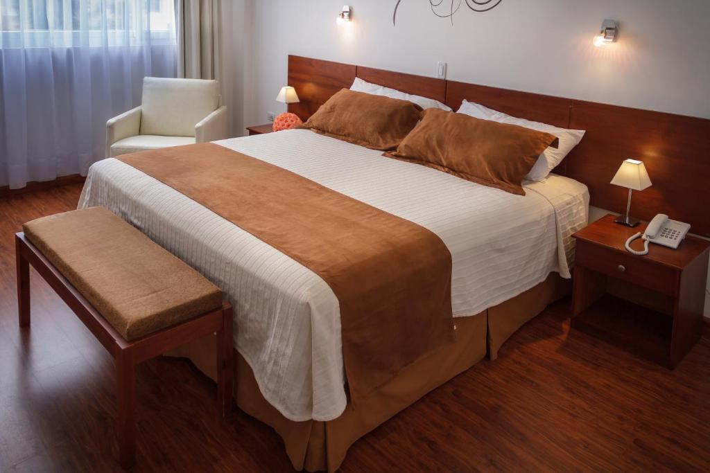 Postel nebo postele na pokoji v ubytování Hotel Ajavi