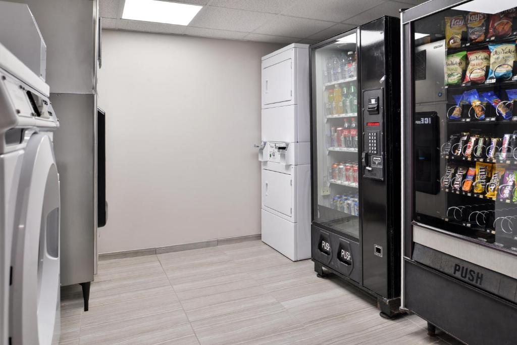 a room with a refrigerator with drinks in it at Cabana Shores Hotel in Myrtle Beach
