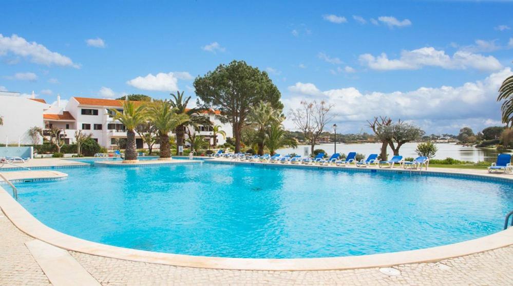 The swimming pool at or near Quinta do Lago Villa Sleeps 2 Pool Air Con WiFi