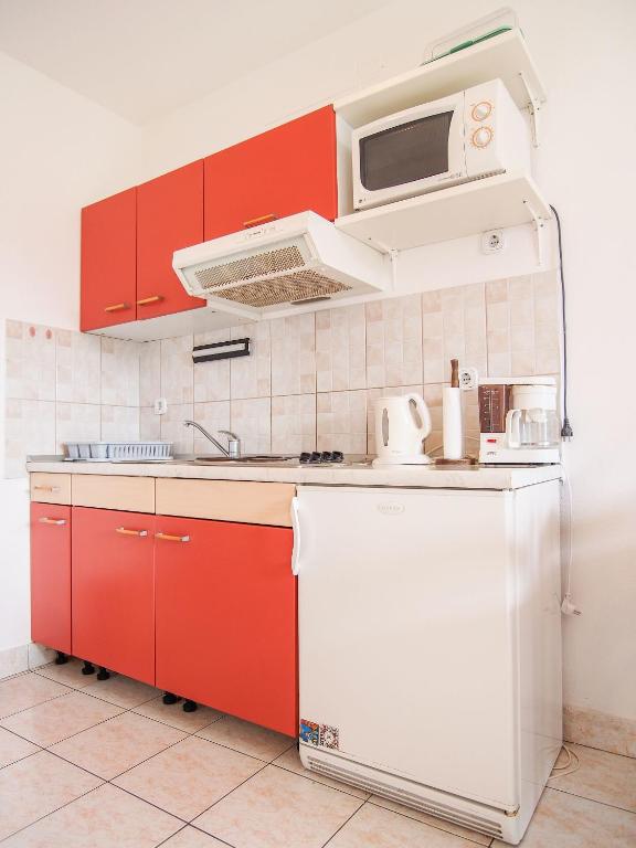 Kuchyň nebo kuchyňský kout v ubytování Apartments Dirk