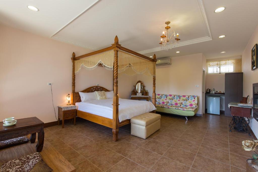 Postel nebo postele na pokoji v ubytování Gengmengyuan B&B