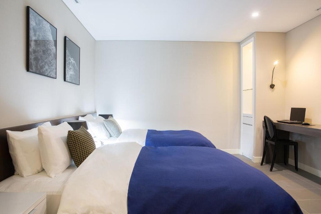 Postel nebo postele na pokoji v ubytování Hotel Mate Bundang
