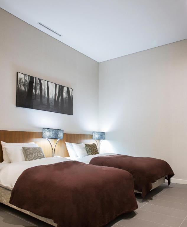 Postel nebo postele na pokoji v ubytování Hotel Mate Bundang