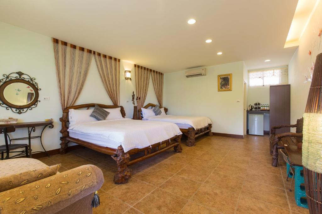 Postel nebo postele na pokoji v ubytování Gengmengyuan B&B