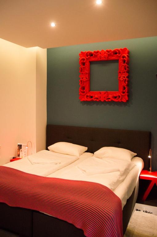 Postel nebo postele na pokoji v ubytování Hotel Mátrix