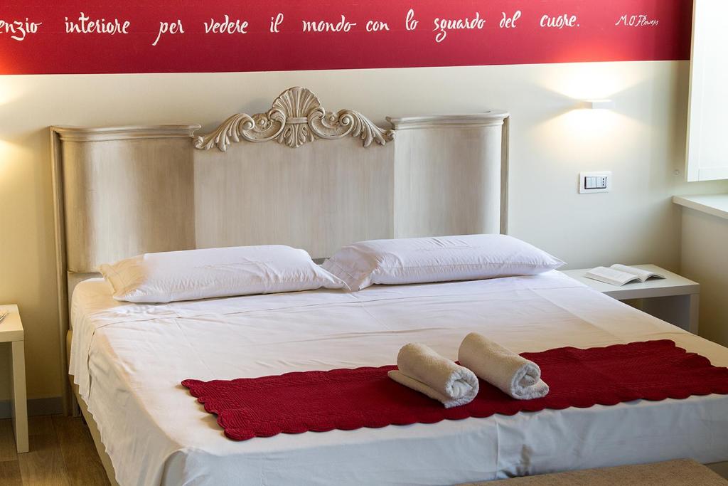 Postel nebo postele na pokoji v ubytování Villa di Cazzano - BioLuxury Living