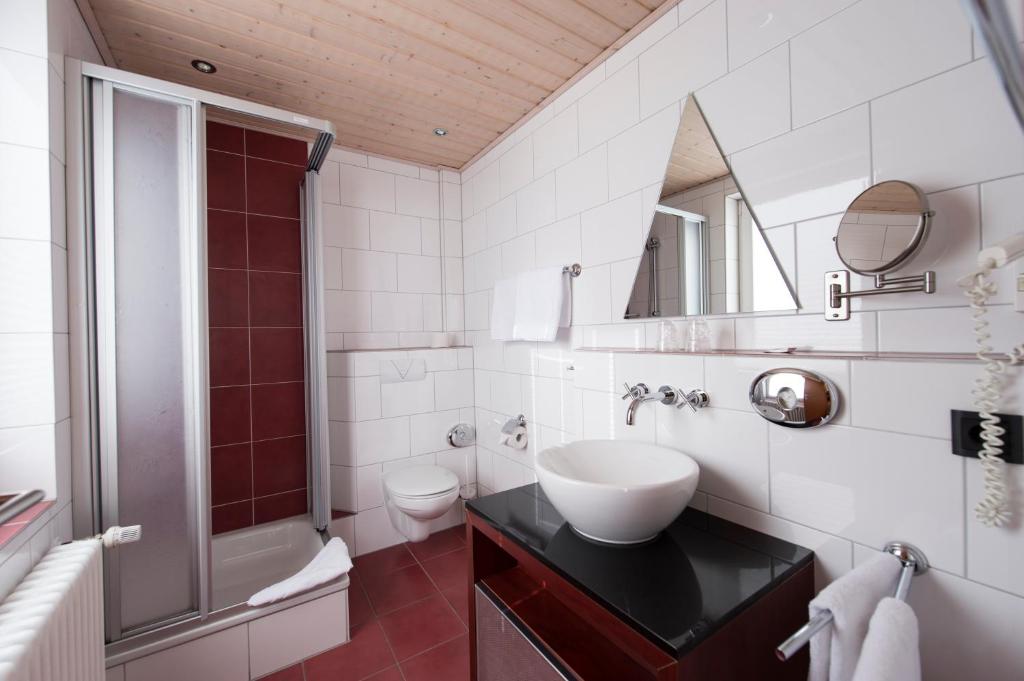 Koupelna v ubytování Hotel Garni Elegant
