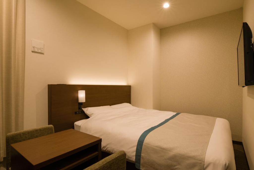 Tosei Hotel Cocone Ueno房間的床