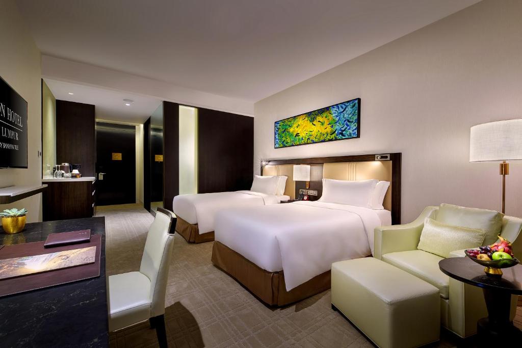 Postel nebo postele na pokoji v ubytování Pavilion Hotel Kuala Lumpur Managed by Banyan Tree