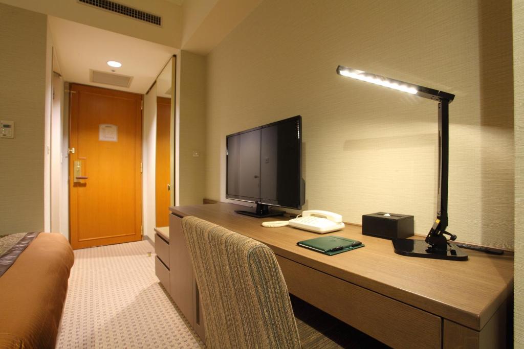 TV a/nebo společenská místnost v ubytování Hotel Metropolitan Nagano