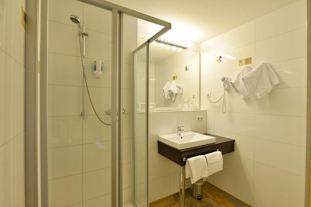 Koupelna v ubytování INVITE Hotel Nürnberg City
