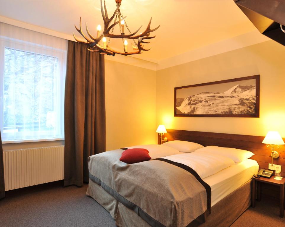 Postel nebo postele na pokoji v ubytování Ski Lodge Reineke