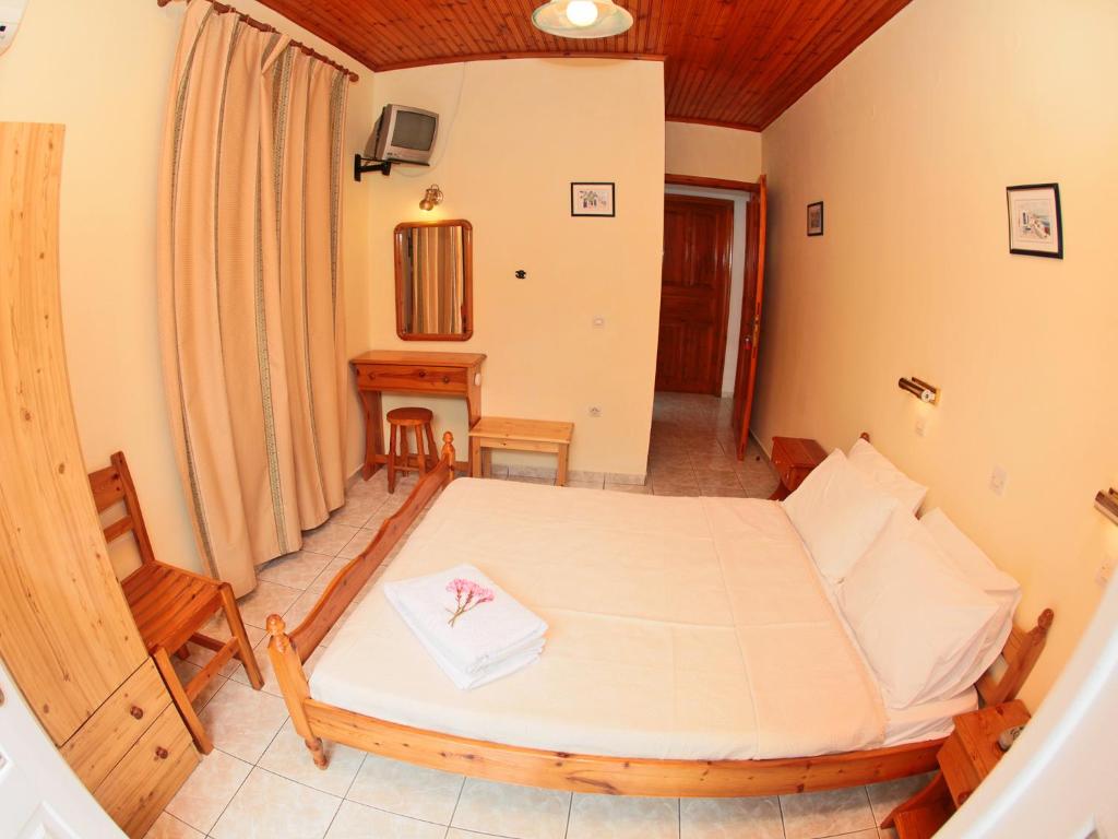 Postel nebo postele na pokoji v ubytování Glaros Guesthouse