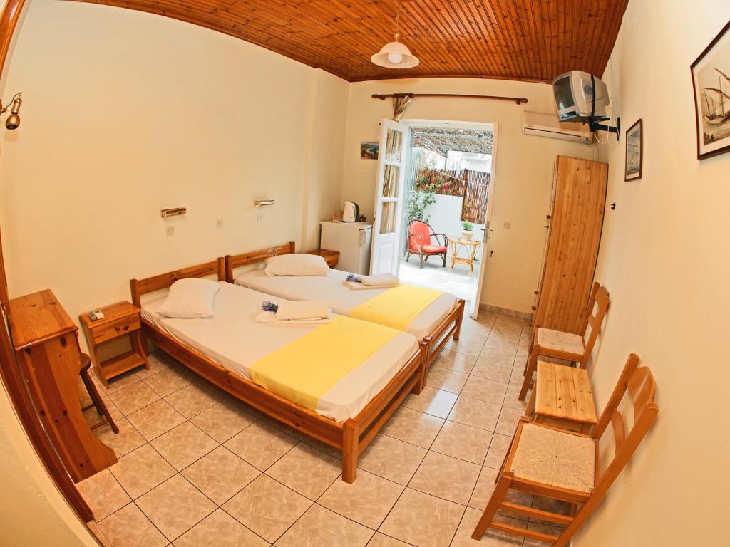 Postel nebo postele na pokoji v ubytování Glaros Guesthouse