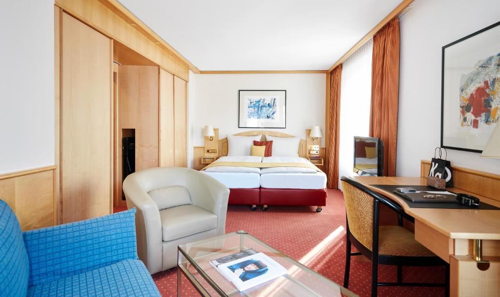 Ein Bett oder Betten in einem Zimmer der Unterkunft Living Hotel Großer Kurfürst