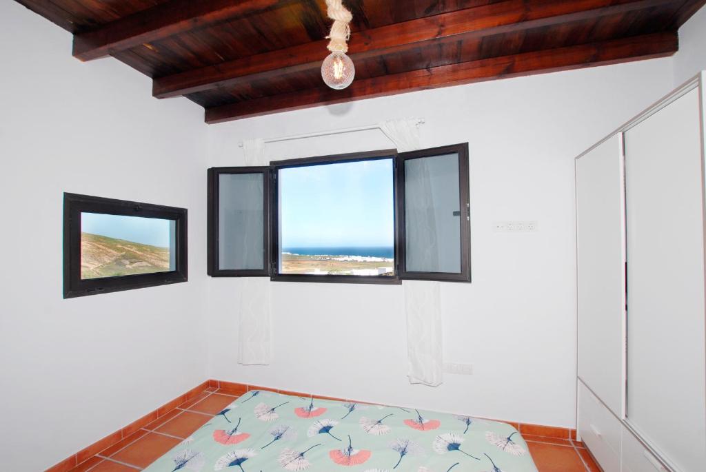 Posteľ alebo postele v izbe v ubytovaní Apartamento PANCHO