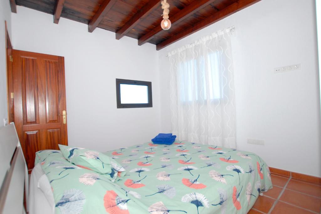 Posteľ alebo postele v izbe v ubytovaní Apartamento PANCHO