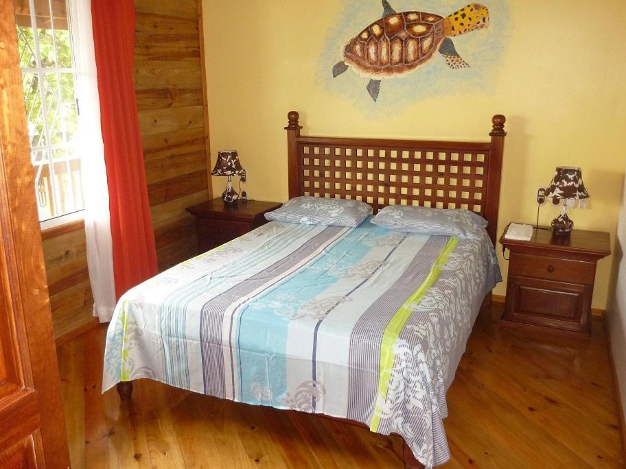 Postel nebo postele na pokoji v ubytování Wikkid Resort