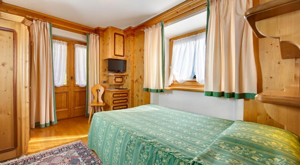 TV a/nebo společenská místnost v ubytování Hotel Natale