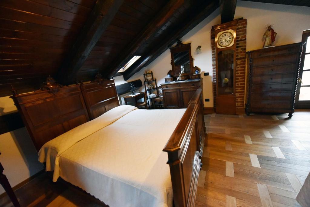 Postel nebo postele na pokoji v ubytování Agriturismo La Ca 'd Majin