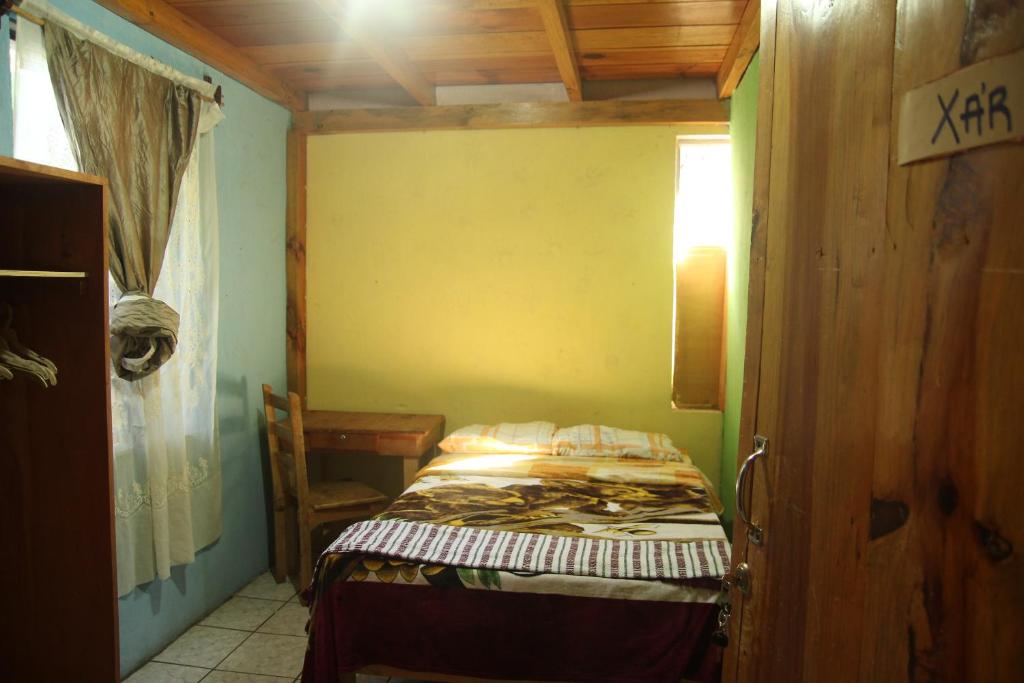 Cama o camas de una habitación en Posada Maná