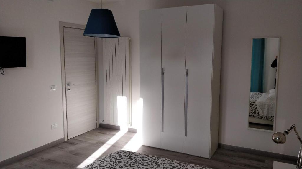 Telewizja i/lub zestaw kina domowego w obiekcie Novantatrè