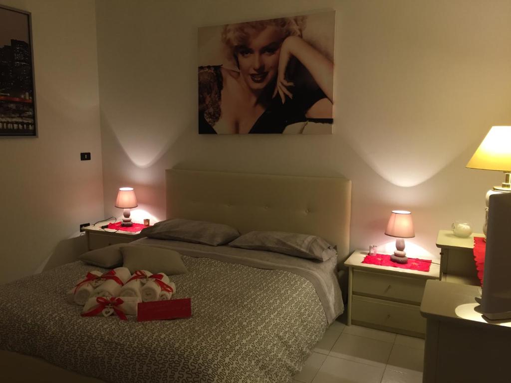 Postel nebo postele na pokoji v ubytování B&B Le Colombine