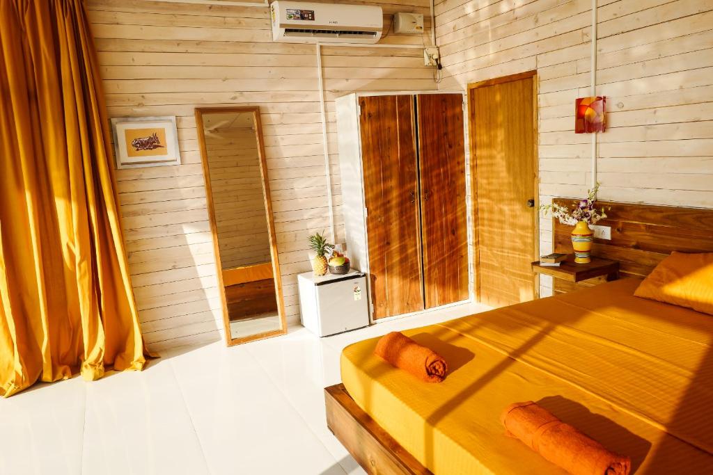 Voodi või voodid majutusasutuse Abidal Resort toas