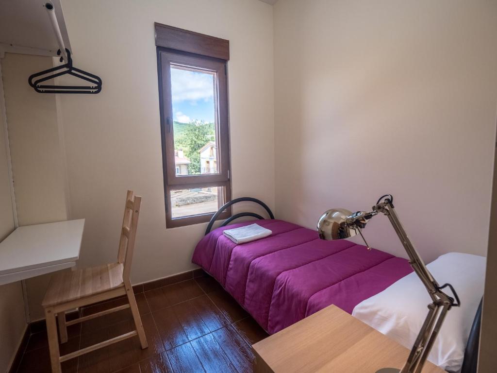 Postel nebo postele na pokoji v ubytování Albergue de Prioro