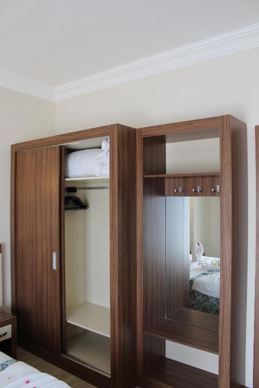 Postel nebo postele na pokoji v ubytování Side West Park Hotel
