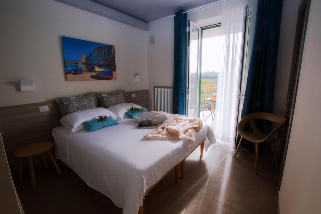 Postel nebo postele na pokoji v ubytování Casa Borgo Regina B&B - Bari Puglia Apartments