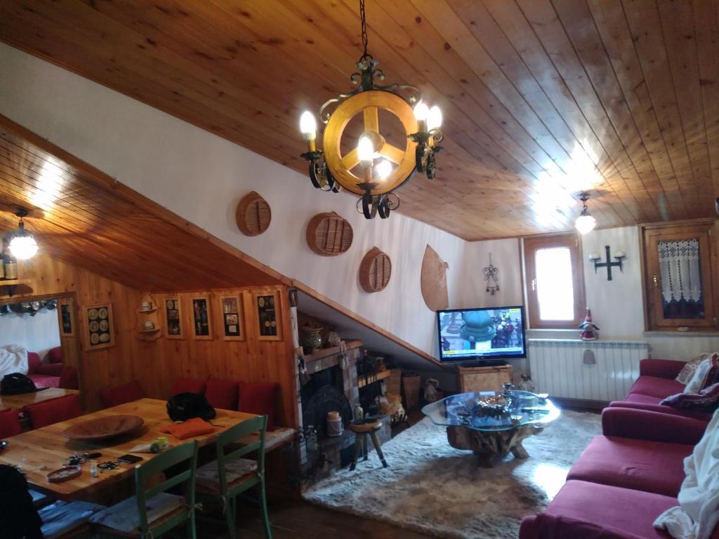 Telewizja i/lub zestaw kina domowego w obiekcie Condominio Esagono