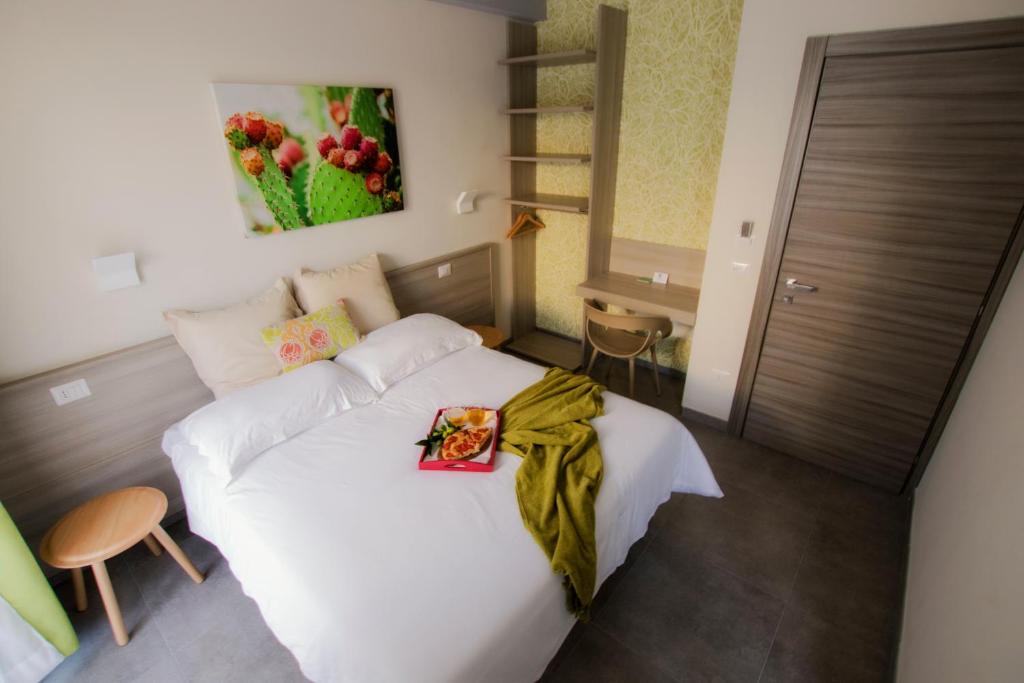 Säng eller sängar i ett rum på Casa Borgo Regina B&B - Bari Puglia Apartments