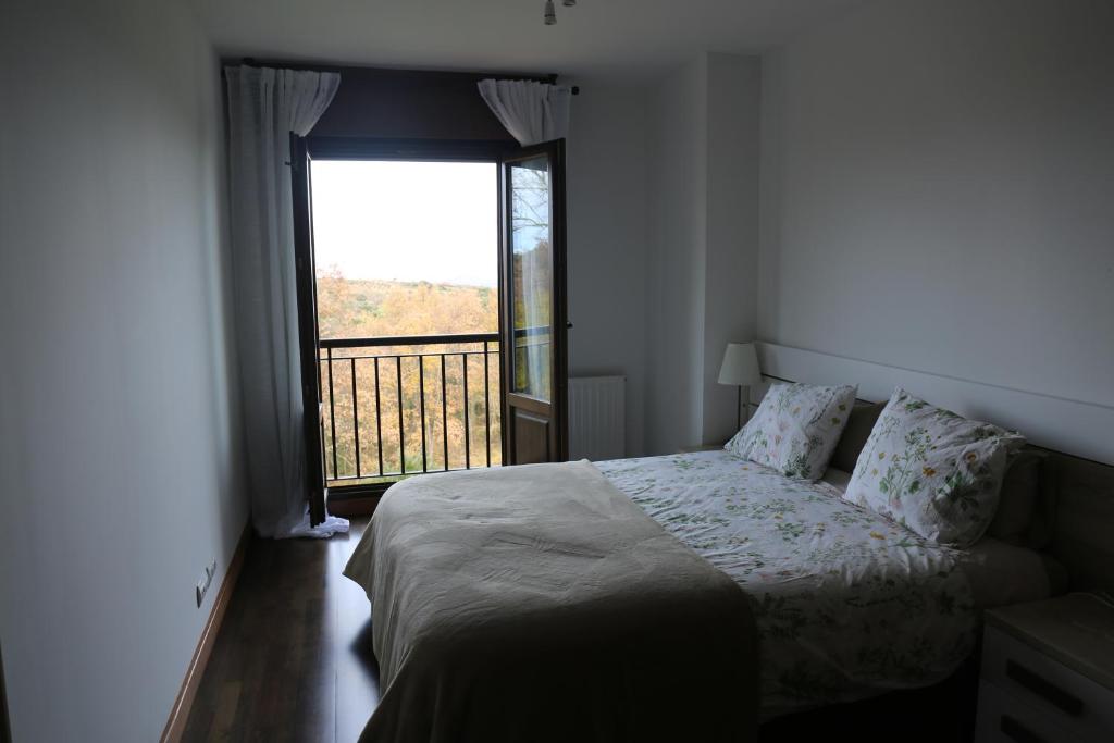 Postel nebo postele na pokoji v ubytování Apartamentos Campo de Golf