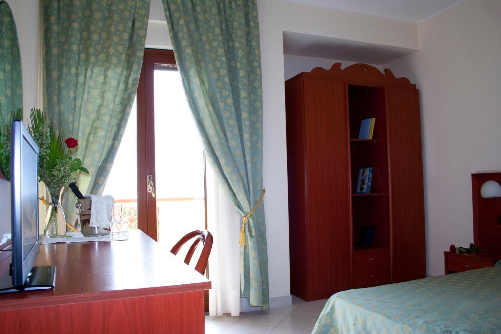 Letto o letti in una camera di Hotel Felix